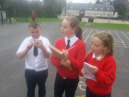 Cole, Alannah and Caoimhe working very studiously on their Maths Trail!